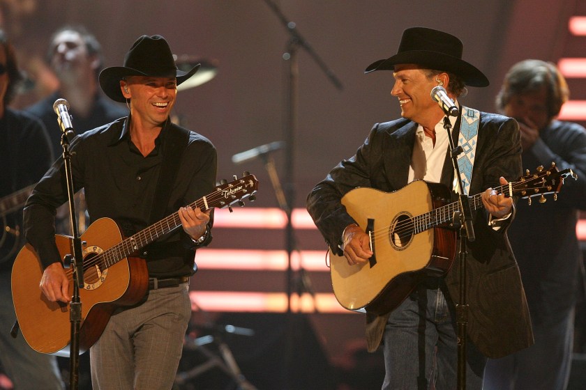 LAS VEGAS - MAY 18: Musicians Kenny Chesney (L) and George Strait perform onstage during the 43rd annual Academy Of Country Music Awards held at the MGM Grand Garden Arena on May 18, 2008 in Las Vegas, Nevada.