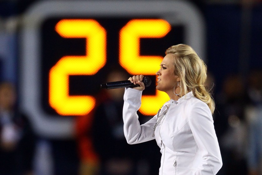 MIAMI GARDENS, FL - FEBRUARY 07: Singer Carrie Underwood performs during the pregame show prior to Super Bowl XLIV between the Indianapolis Colts and the New Orleans Saints on February 7, 2010 at Sun Life Stadium in Miami Gardens, Florida.