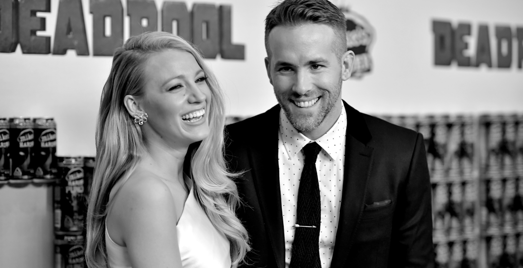 An alternative view of Blake Lively (L) and Ryan Reynolds at the "Deadpool" fan event at AMC Empire Theatre on February 8, 2016 in New York City