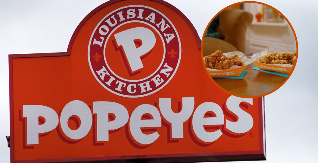 A sign hangs outside of a Popeyes Louisiana Kitchen restaurant on May 06, 2021 in Chicago, Illinois. Chicken prices have risen sharply this year as suppliers struggle to keep up with demand, fueled in part, by the popularity of new chicken offerings from fast-food restaurants.