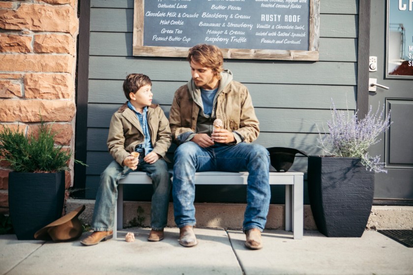 Brecken Merrill as Tate Dutton and Luke Grimes as Kayce Dutton in 'Yellowstone' Season 1, Episode 1