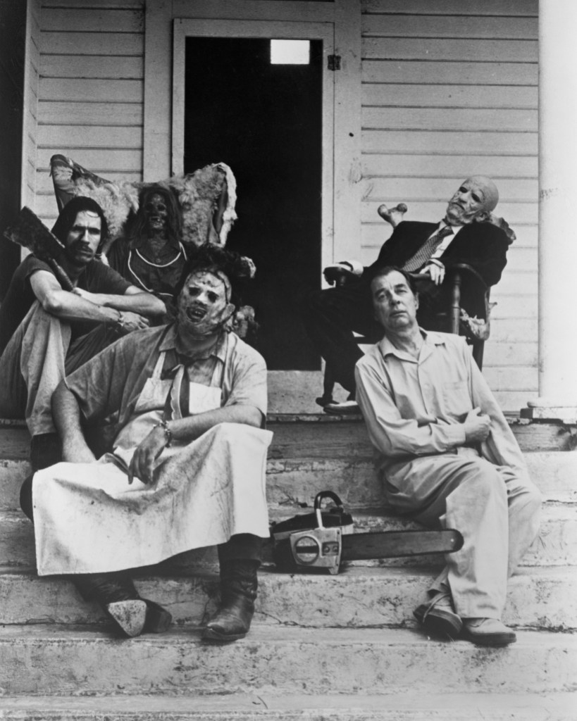Actors Gunnar Hansen (front left) as Leatherface, Jim Siedow (front right) as Old Man, John Dugan (back right) as Grandfather and Edwin Neal (back left) as Hitchhiker in a publicity shot for the slasher film 'The Texas Chain Saw Massacre, 1974.