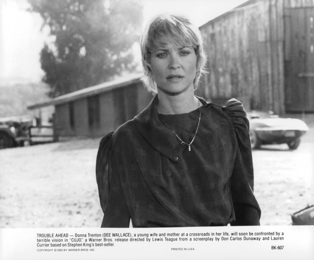 Dee Wallace standing outside in a scene from the film 'Cujo', 1983. 