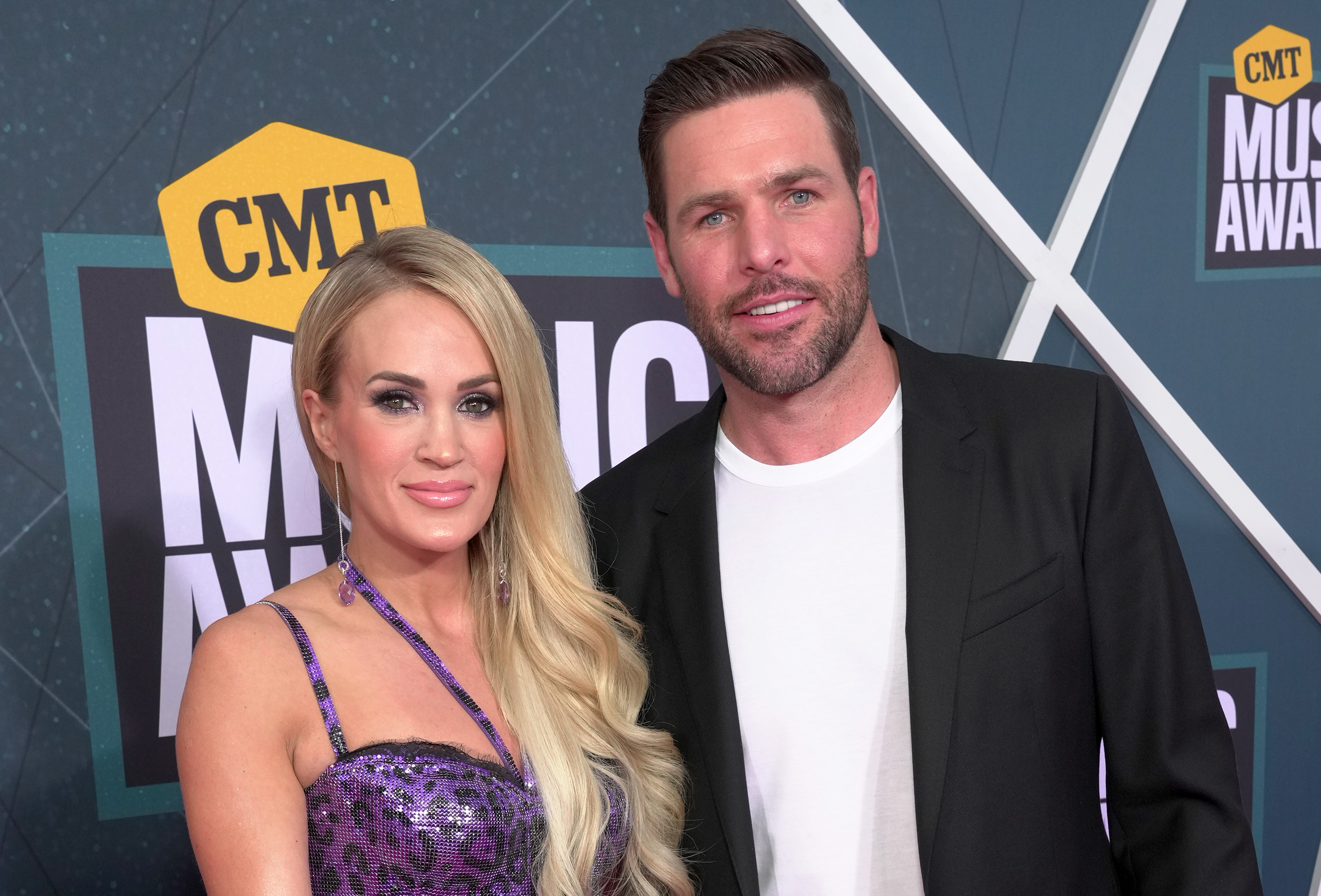 NASHVILLE, TENNESSEE - APRIL 11: Carrie Underwood and Mike Fisher attend the 2022 CMT Music Awards at Nashville Municipal Auditorium on April 11, 2022 in Nashville, Tennessee.
