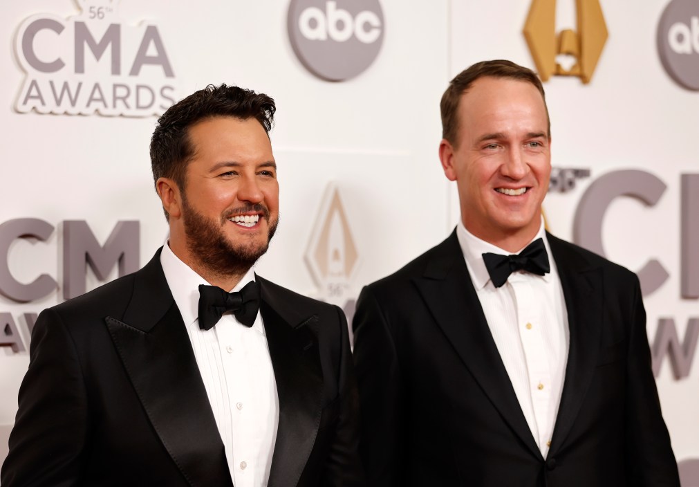 NASHVILLE, TENNESSEE - NOVEMBER 09: Luke Bryan and Peyton Manning attend The 56th Annual CMA Awards at Bridgestone Arena on November 09, 2022 in Nashville, Tennessee.