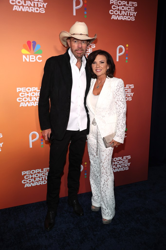 (L-R) Toby Keith and Tricia Lucus attend the 2023 People's Choice Country Awards at The Grand Ole Opry on September 28, 2023 in Nashville, Tennessee.