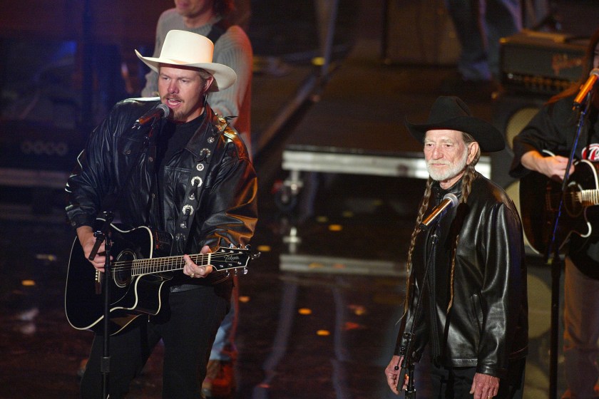 Toby Keith and Willie Nelson perform "Beer For My Horses" at the 30th Annual AMAs at the Shrine Auditorium in Los Angeles, Ca. Monday, Jan. 13, 2003.