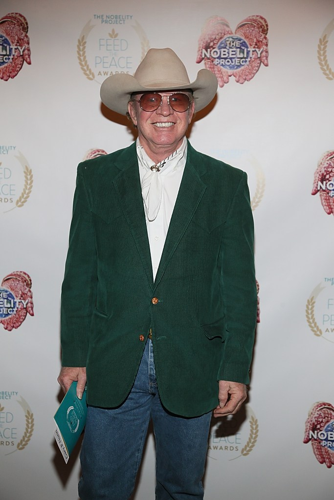 AUSTIN, TX - FEBRUARY 09: Gary P. Nunn walks the red carpet during the Feed The Peace Awards banquet at the Four Seasons Hotel on February 9, 2014 in Austin, Texas. 