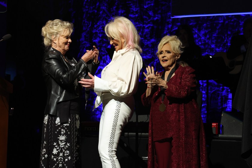 (L-R) Connie Smith, honoree, Tanya Tucker and Brenda Lee speak onstage during the Class of 2023 Medallion Ceremony at Country Music Hall of Fame and Museum on October 22, 2023 in Nashville, Tennessee. (Photo by Terry Wyatt/Getty Images)