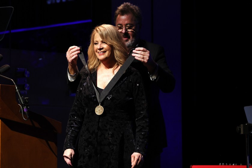 NASHVILLE, TENNESSEE - OCTOBER 22: (EDITORIAL USE ONLY) (L-R) Honoree, Patty Loveless and Vince Gill seen onstage during the Class of 2023 Medallion Ceremony at Country Music Hall of Fame and Museum on October 22, 2023 in Nashville, Tennessee. 