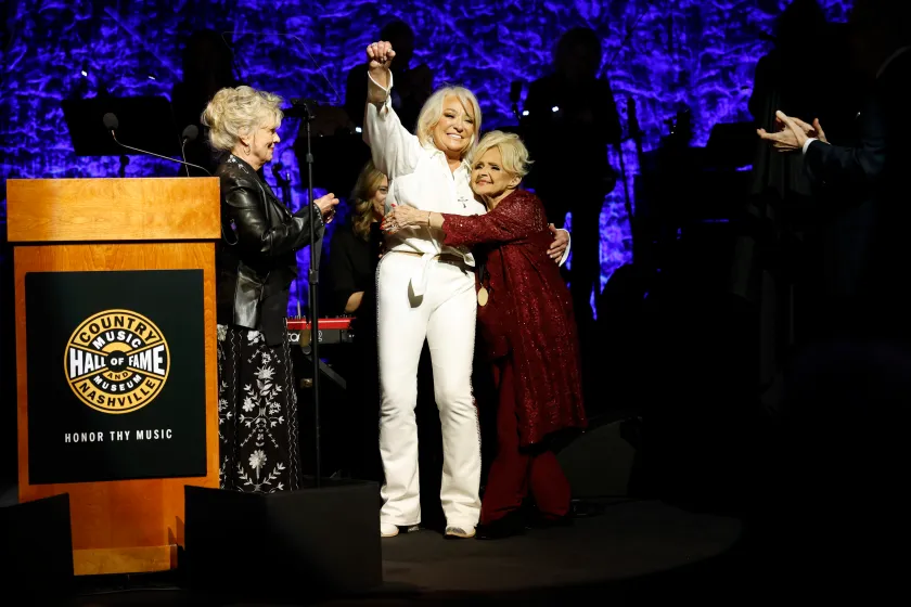 NASHVILLE, TENNESSEE - OCTOBER 22: (EDITORIAL USE ONLY) (L-R) Connie Smith, honoree, Tanya Tucker and Brenda Lee speak onstage during the Class of 2023 Medallion Ceremony at Country Music Hall of Fame and Museum on October 22, 2023 in Nashville, Tennessee
