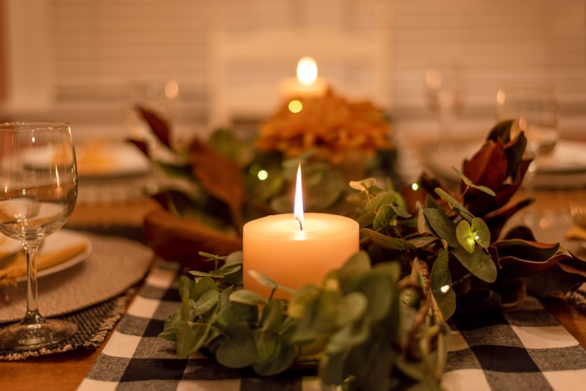 Cozy holiday table setting with candles