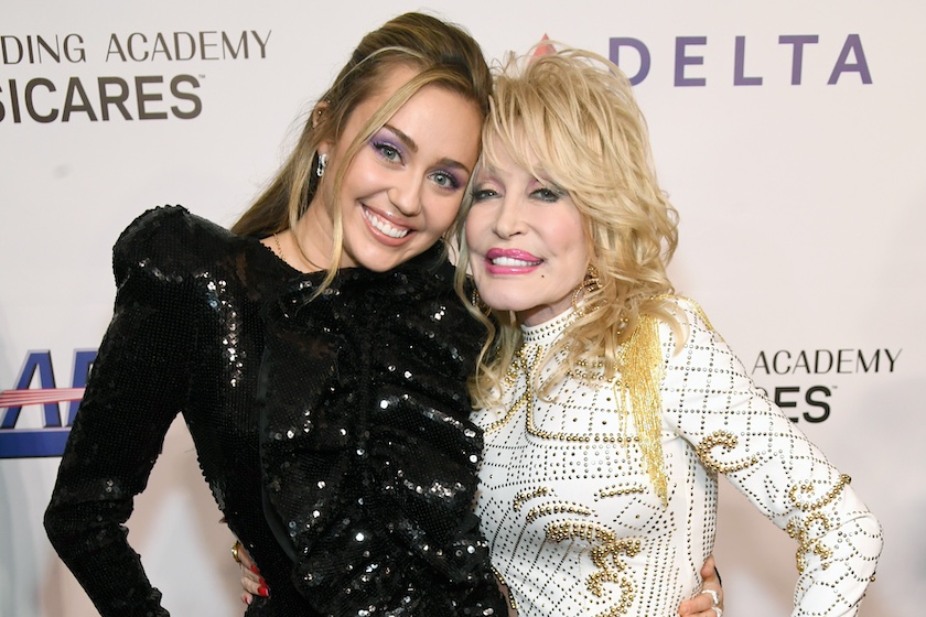 LOS ANGELES, CA - FEBRUARY 08: Miley Cyrus (L) and Dolly Parton attend MusiCares Person of the Year honoring Dolly Parton at Los Angeles Convention Center on February 8, 2019 in Los Angeles, California. 