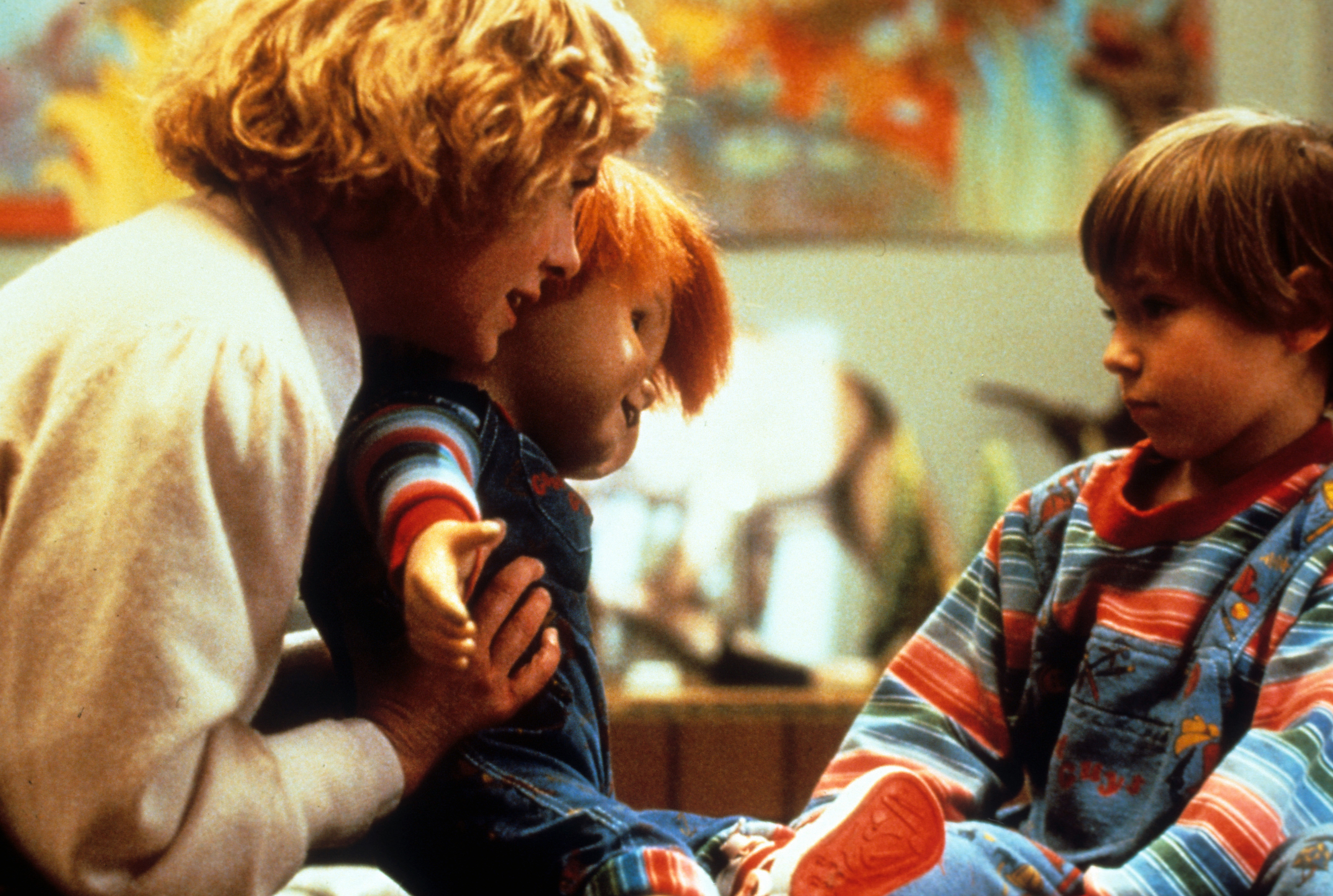 Actress Catherine Hicks and child actor Alex Vincent with Chucky in a scene from the film 'Child's Play', 1988. 