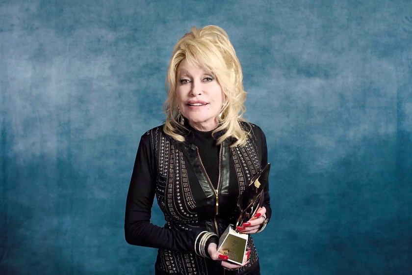 UNSPECIFIED - DECEMBER 10: In this screengrab released on December 10, Dolly Parton accepts the Hitmaker Award during the Billboard Women In Music 2020 event on December 10, 2020. 