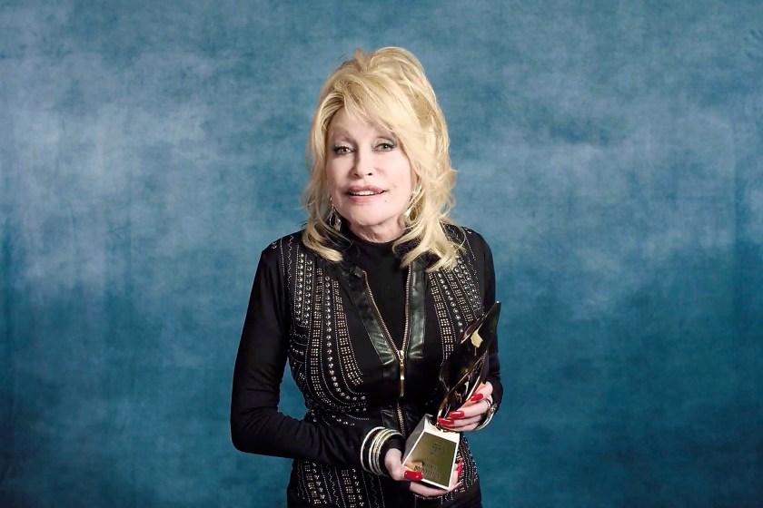 UNSPECIFIED - DECEMBER 10: In this screengrab released on December 10, Dolly Parton accepts the Hitmaker Award during the Billboard Women In Music 2020 event on December 10, 2020.