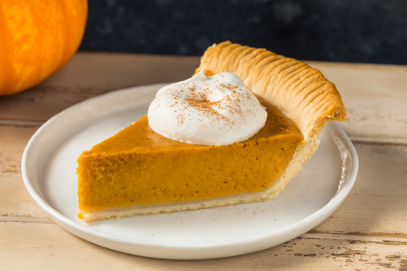 Homemade Thanksgiving Pumpkin Pie with Whipped Cream and Spice