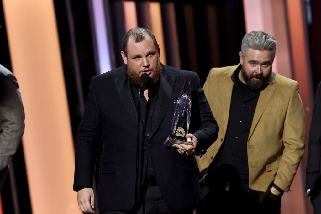 NASHVILLE, TENNESSEE - NOVEMBER 09: Luke Combs accepts the Album of the Year award for "Growin' Up" onstage at The 56th Annual CMA Awards at Bridgestone Arena on November 09, 2022 in Nashville, Tennessee.