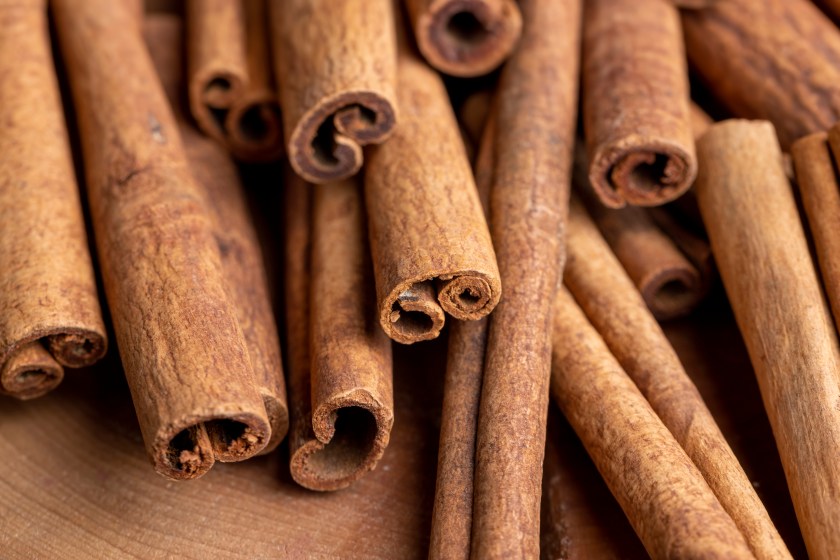 Whole dried cinnamon for baking, heaped fragrant cinnamon spice