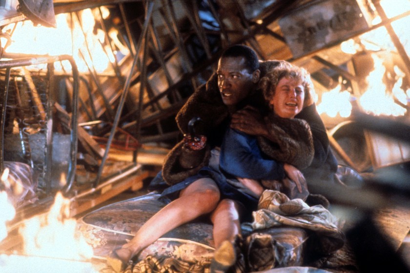 Tony Todd holds onto Virginia Madsen in a scene from the film 'Candyman', 1992.