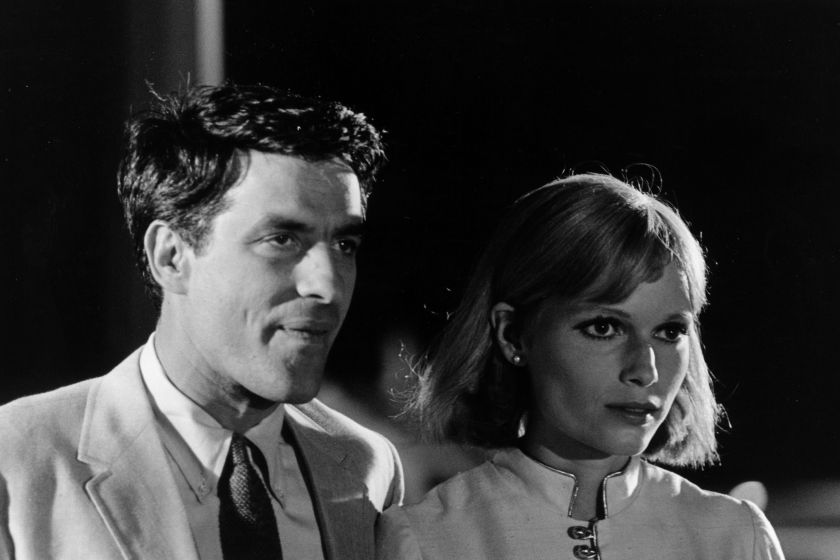 25th August 1967: American film actress, Mia Farrow, with film director and actor, John Cassavetes (1929 - 1989), during the filming of 'Rosemary's Baby', a dark thriller which was directed by Roman Polanski. 