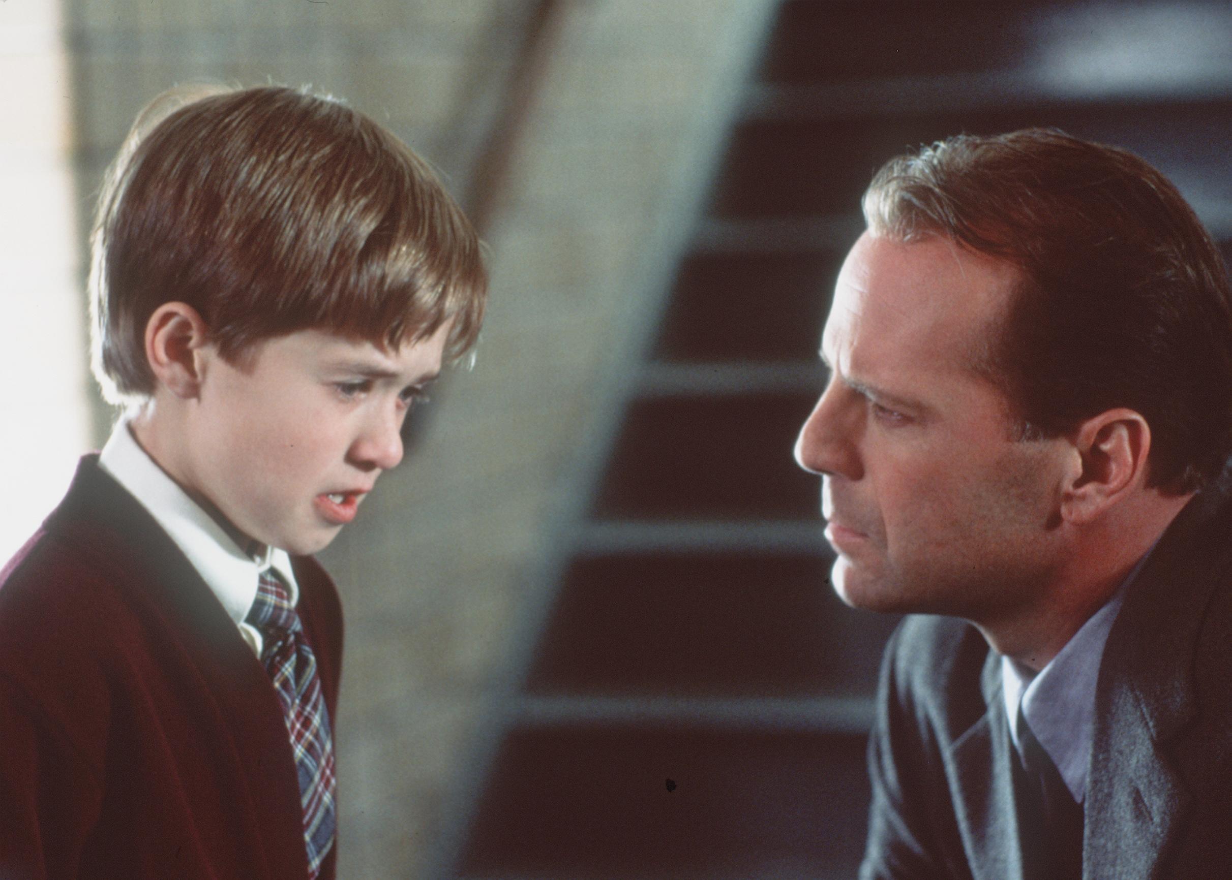 382325 01: Bruce Willis Stars As Child Psychologist Dr. Malcolm Crowe And Haley Joel Osment (L) Stars As Cole Sear Who Has A Dark Secret In "The Sixth Sense." 