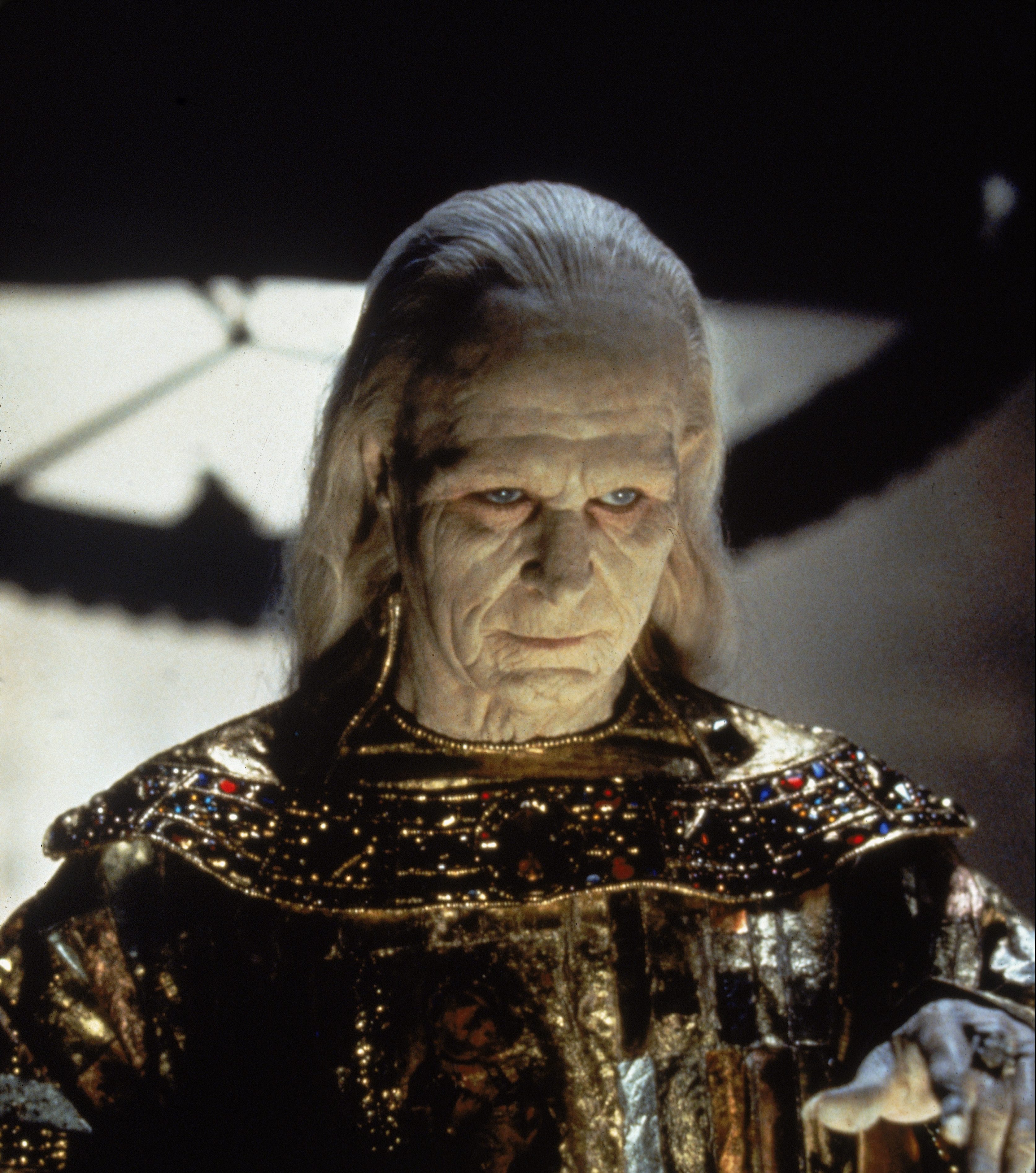 British actor Gary Oldman, very heavily made up and dressed in a metallic. jewel-encrusted cape, gestures menacingly in a scene from the film 'Bram Stoker's Dracula,' directed by Francis Ford Coppola, California, 1992. 