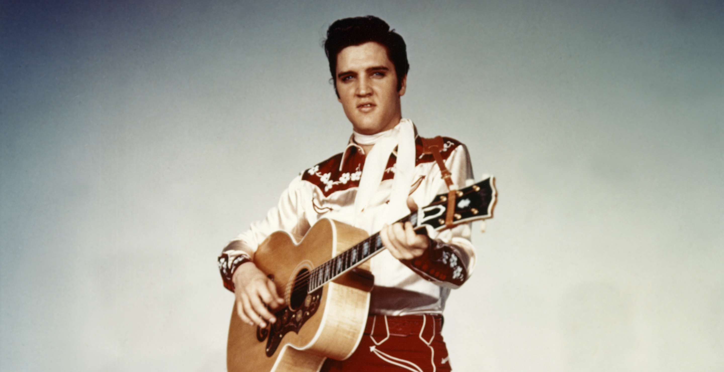 American singer and actor Elvis Presley promoting the movie Loving You, written and directed by Hal Kanter.