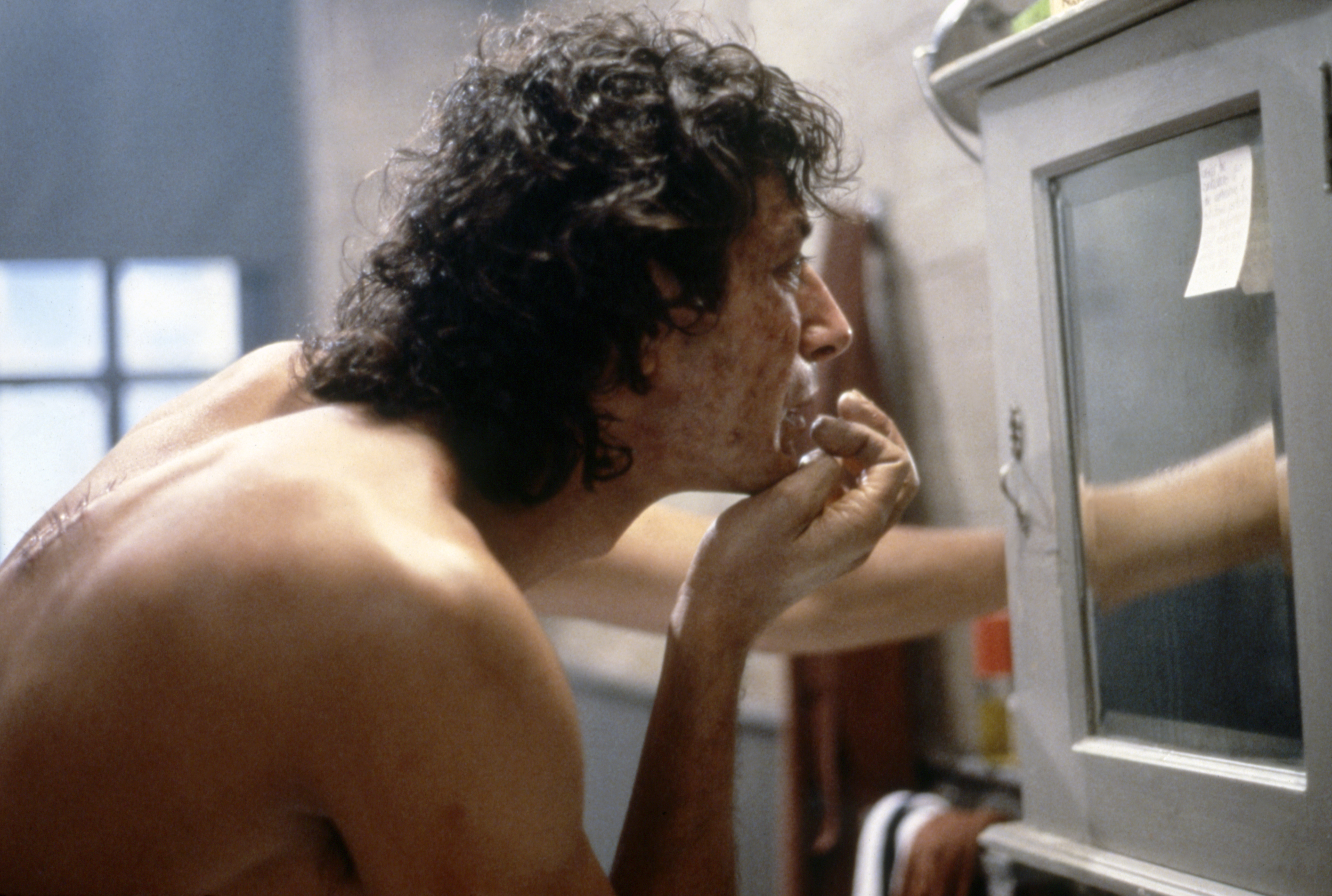 American actor Jeff Goldblum on the set of The Fly, directed by David Cronenberg. 