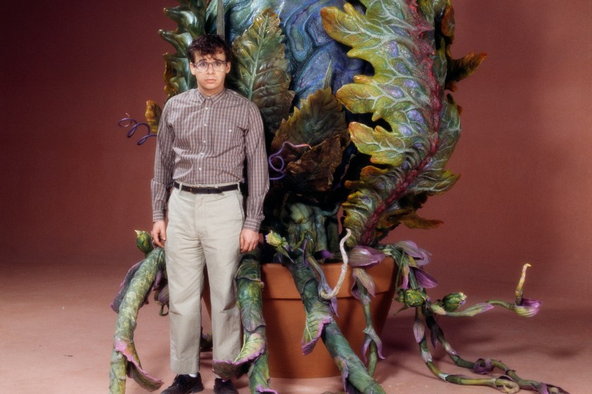 Actor Rick Moranis with the plant Audrey II of the film Little Shop of Horrors.