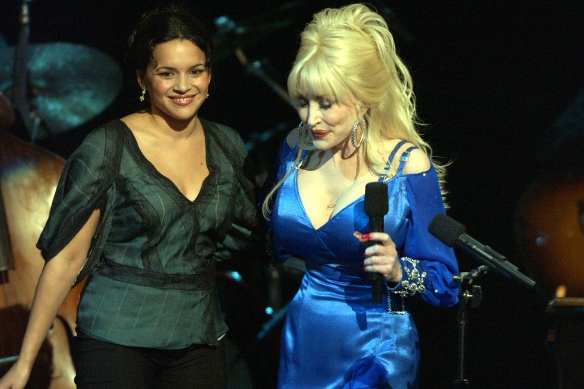 Norah Jones and Dolly Parton perform a duet of the song "The Grass Is Blue" 