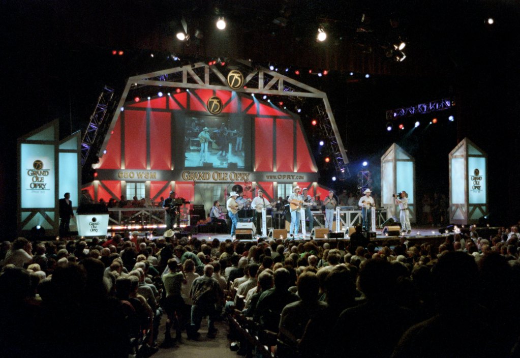 NASHVILLE, TN - 2000: Country music singer Alan Jackson performs at the Grand Ole Opry in Nashville, Tennessee, in 2000, during the Opry's 75th anniversary.