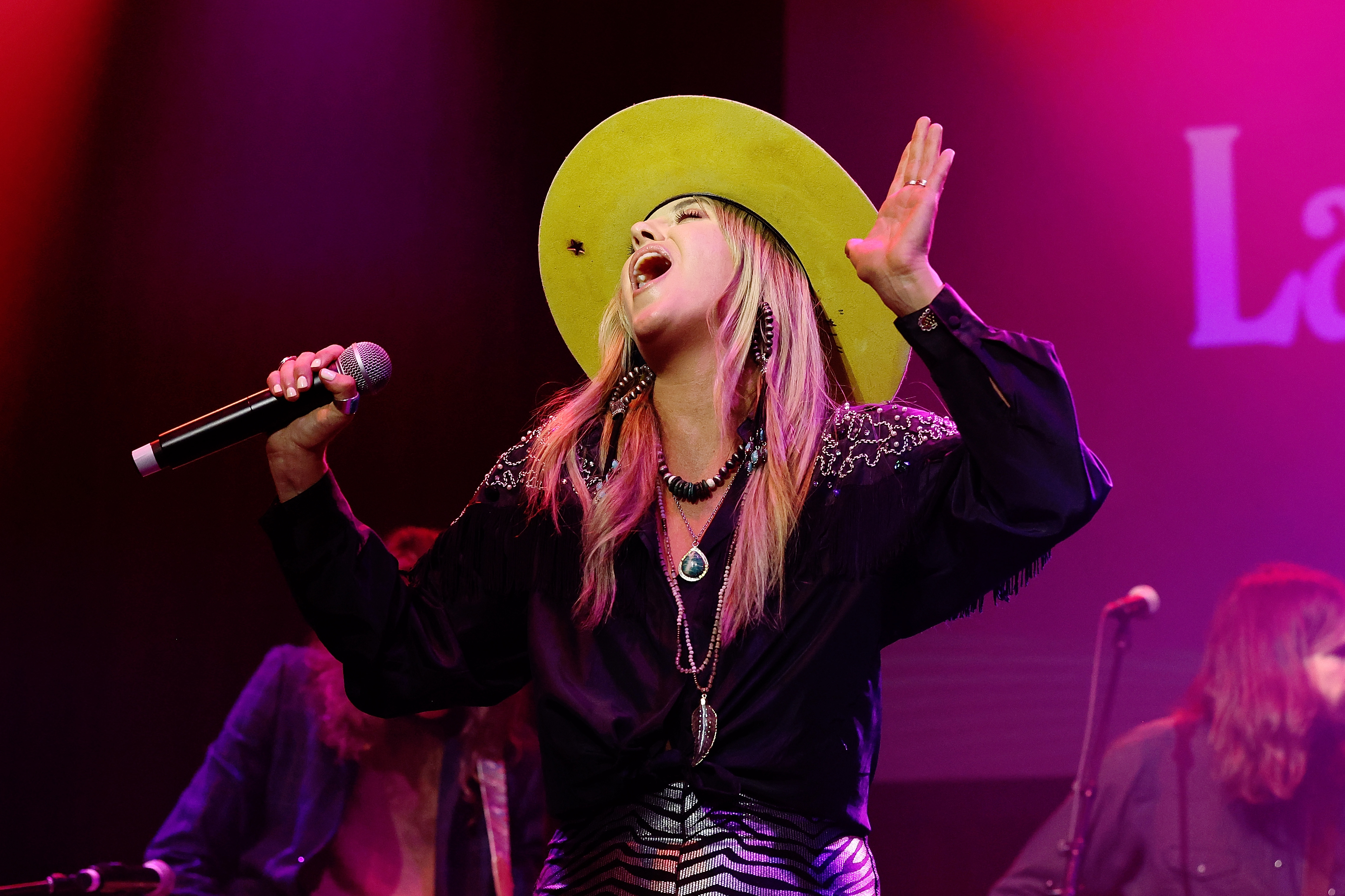 NASHVILLE, TENNESSEE - NOVEMBER 08: Lainey Wilson performs during the 2022 BMG Pre-CMA Party at Brooklyn Bowl Nashville on November 08, 2022 in Nashville, Tennessee. 