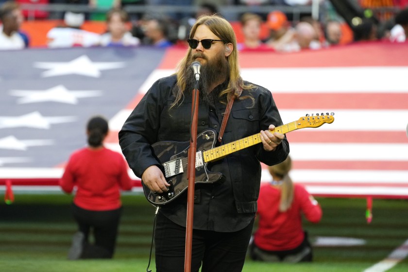 FEBRUARY 12: Chris Stapleton performs the national anthem during Super Bowl LVII at State Farm Stadium on February 12, 2023 in Glendale, Arizona.