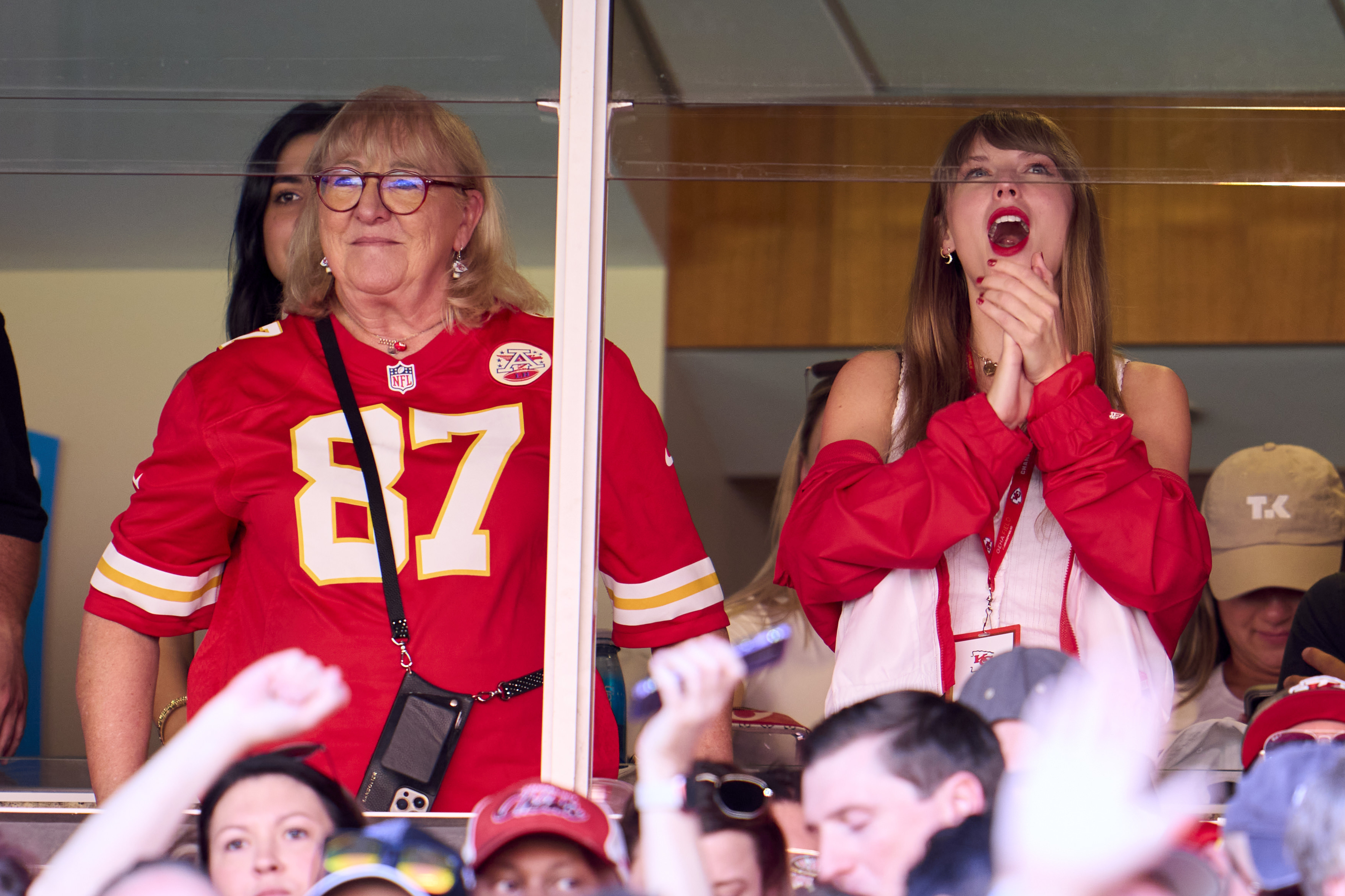 KANSAS CITY, MO - SEPTEMBER 24: Taylor Swift cheers from a suite with Donna Kelce as the Kansas City Chiefs play the Chicago Bears during the first half at GEHA Field at Arrowhead Stadium on September 24, 2023 in Kansas City, Missouri.