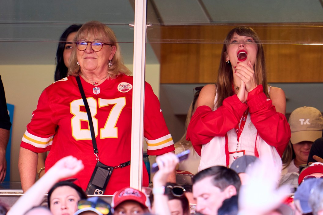KANSAS CITY, MO - SEPTEMBER 24: Taylor Swift cheers from a suite with Donna Kelce as the Kansas City Chiefs play the Chicago Bears during the first half at GEHA Field at Arrowhead Stadium on September 24, 2023 in Kansas City, Missouri.