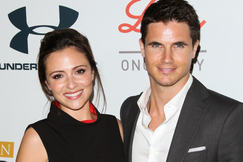 LOS ANGELES, CA - JULY 14: Actors Italia Ricci (L) and Robbie Amell (R) attend the 2015 Sports Humanitarian Of The Year Awards at The Conga Room at L.A. Live on July 14, 2015 in Los Angeles, California. 