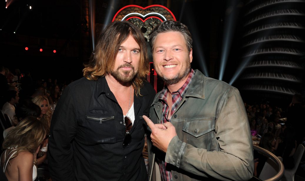 LOS ANGELES, CA - MAY 01: Recording artists Billy Ray Cyrus (L) and Blake Shelton in the audience at the 2014 iHeartRadio Music Awards held at The Shrine Auditorium on May 1, 2014 in Los Angeles, California. iHeartRadio Music Awards are being broadcast live on NBC.