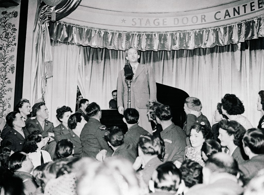 Bing Crosby Singing at Microphone for a crowd