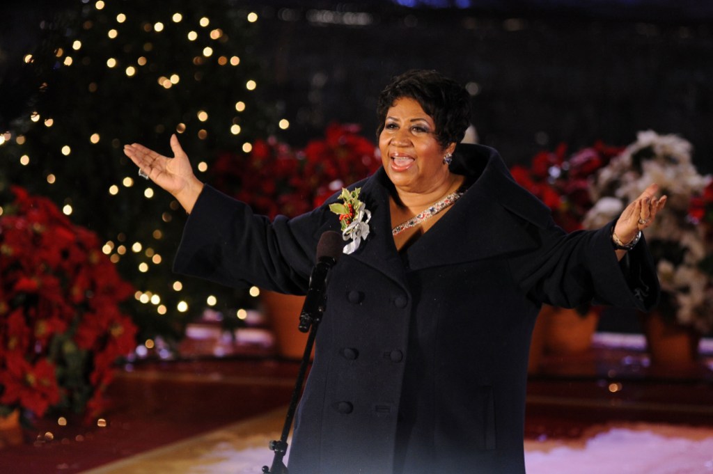 Singer Aretha Franklin performs onstage at attends the Rockefeller Center Christmas tree lighting at Rockefeller Center on December 2, 2009.