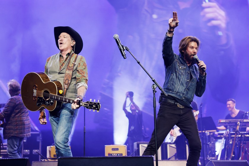 (L-R) Kix Brooks and Ronnie Dunn of Brooks and Dunn perform onstage for All for the Hall a concert hosted by Keith Urban and Vince Gill benefiting the Country Music Hall of Fame and Museum at Bridgestone Arena on December 05, 2023 in Nashville, Tennessee. 