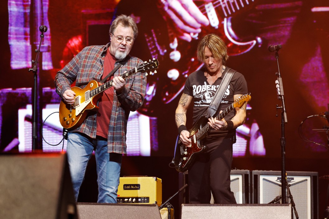 (L-R) Hosts Vince Gill and Keith Urban perform onstage for All for the Hall a concert benefiting the Country Music Hall of Fame and Museum at Bridgestone Arena on December 05, 2023 in Nashville, Tennessee. (Photo by Jason Kempin/Getty Images for the Country Music Hall of Fame and Museum)