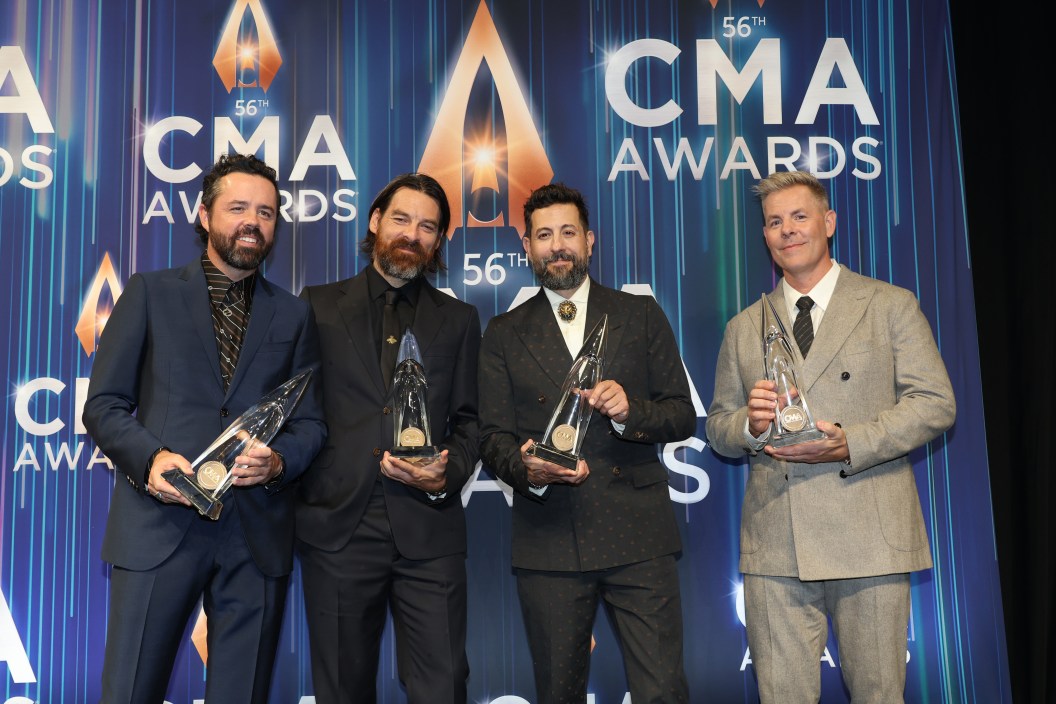 NASHVILLE, TENNESSEE - NOVEMBER 09: Vocal Group of the Year winners (L-R) Geoff Sprung, Brad Tursi, Matthew Ramsey, and Trevor Rosen of Old Dominion pose in the press room during The 56th Annual CMA Awards at Bridgestone Arena on November 09, 2022 in Nashville, Tennessee.
