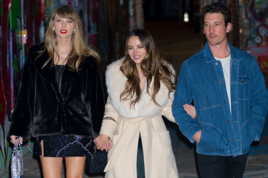 Taylor Swift (L) celebrates her birthday with Keleigh Teller and Miles Teller on December 13, 2023 in New York City.