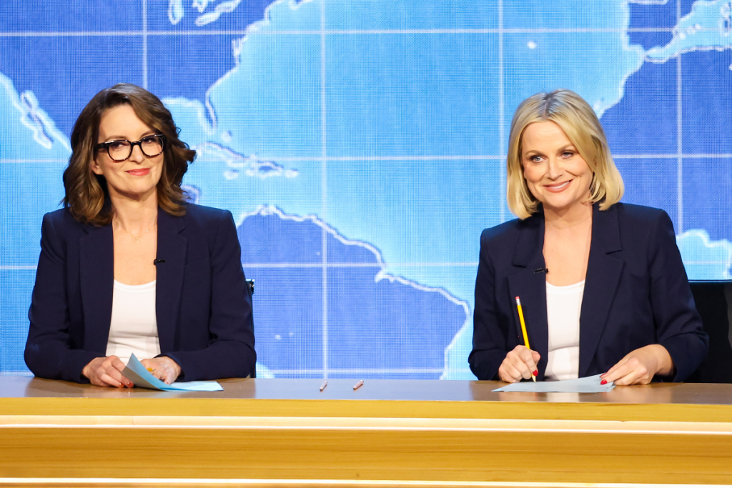 Tina Fey and Amy Poehler speak onstage during the 75th Primetime Emmy Awards