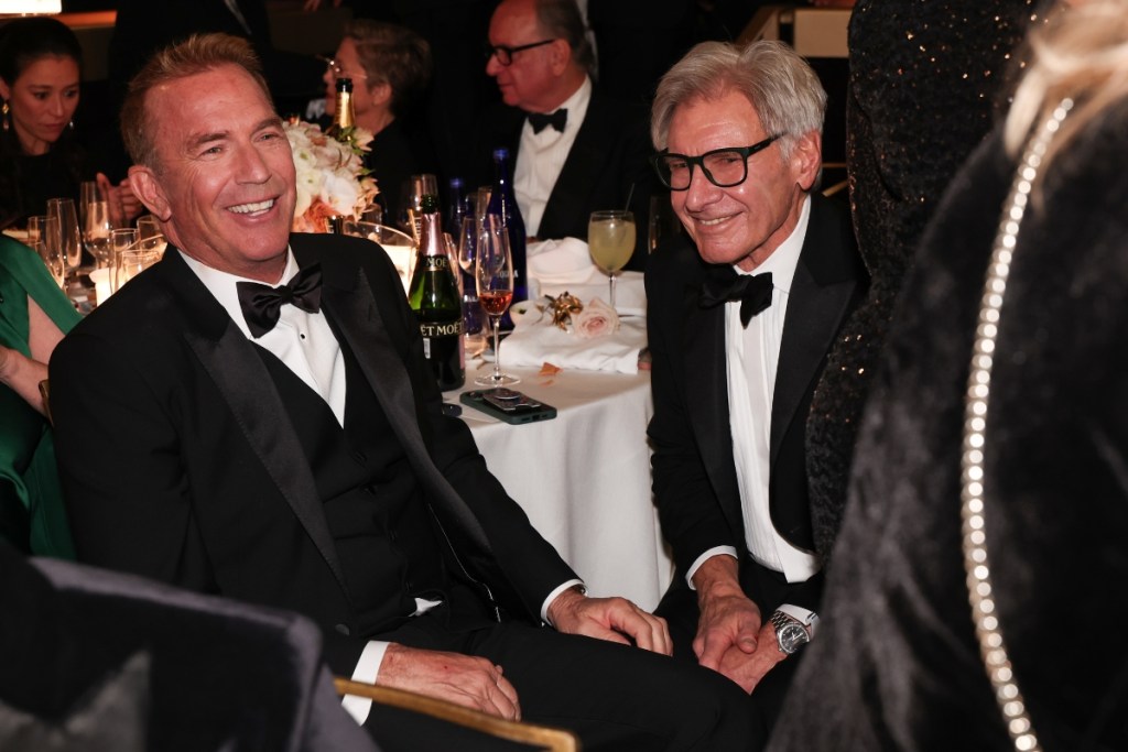 Kevin Costner and Harrison Ford at the 81st Golden Globe Awards