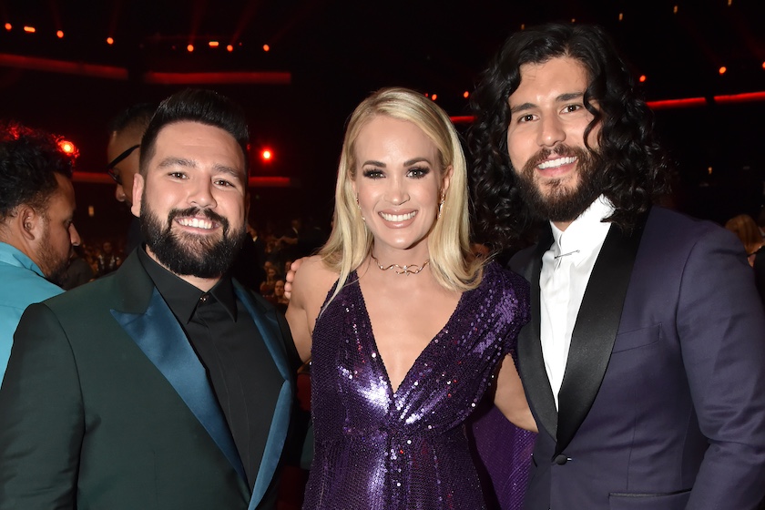 LOS ANGELES, CALIFORNIA - NOVEMBER 24: (L-R) Shay Mooney of Dan + Shay, Carrie Underwood, and Dan Smyers of Dan + Shay attend the 2019 American Music Awards at Microsoft Theater on November 24, 2019 in Los Angeles, California.