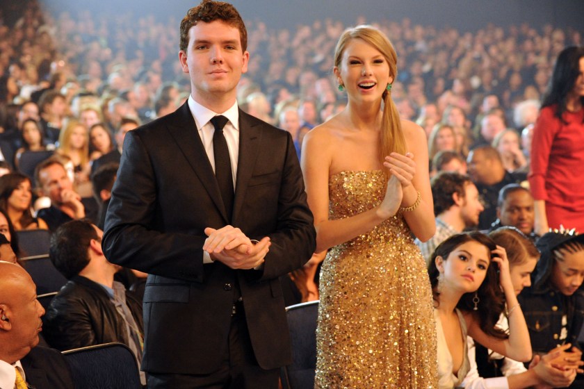 LOS ANGELES, CA - NOVEMBER 20: Singer Taylor Swift (R) and Austin Swift attend the 2011 American Music Awards held at Nokia Theatre L.A. LIVE on November 20, 2011 in Los Angeles, California. 