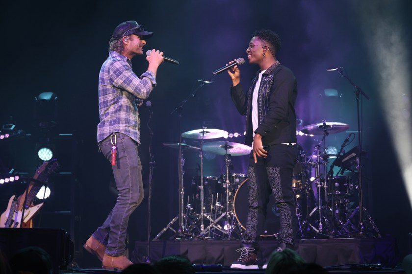 NASHVILLE, TENNESSEE - APRIL 12: (L-R) Dierks Bentley and BRELAND perform onstage for "BRELAND & Friends" concert to benefit the Oasis Center, sponsored by Amazon Music at Ryman Auditorium on April 12, 2022 in Nashville, Tennessee.