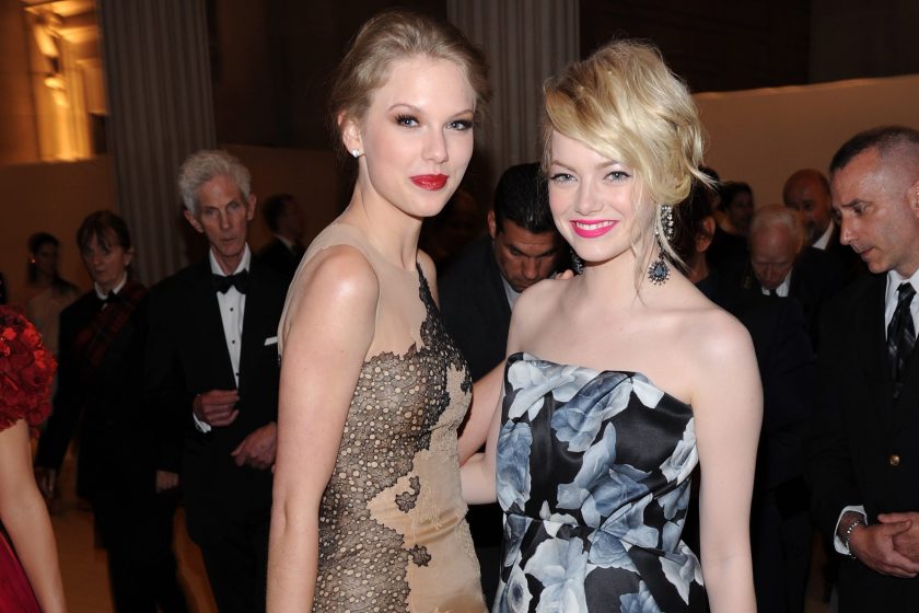 Taylor Swift (L) and Emma Stone attend the Metropolitan Museum of Art's 2011 Costume Institute Gala featuring the opening of the exhibit Alexander McQueen : Savage Beauty. Swift wears J. Mendel and Stone wears Lanvin. 